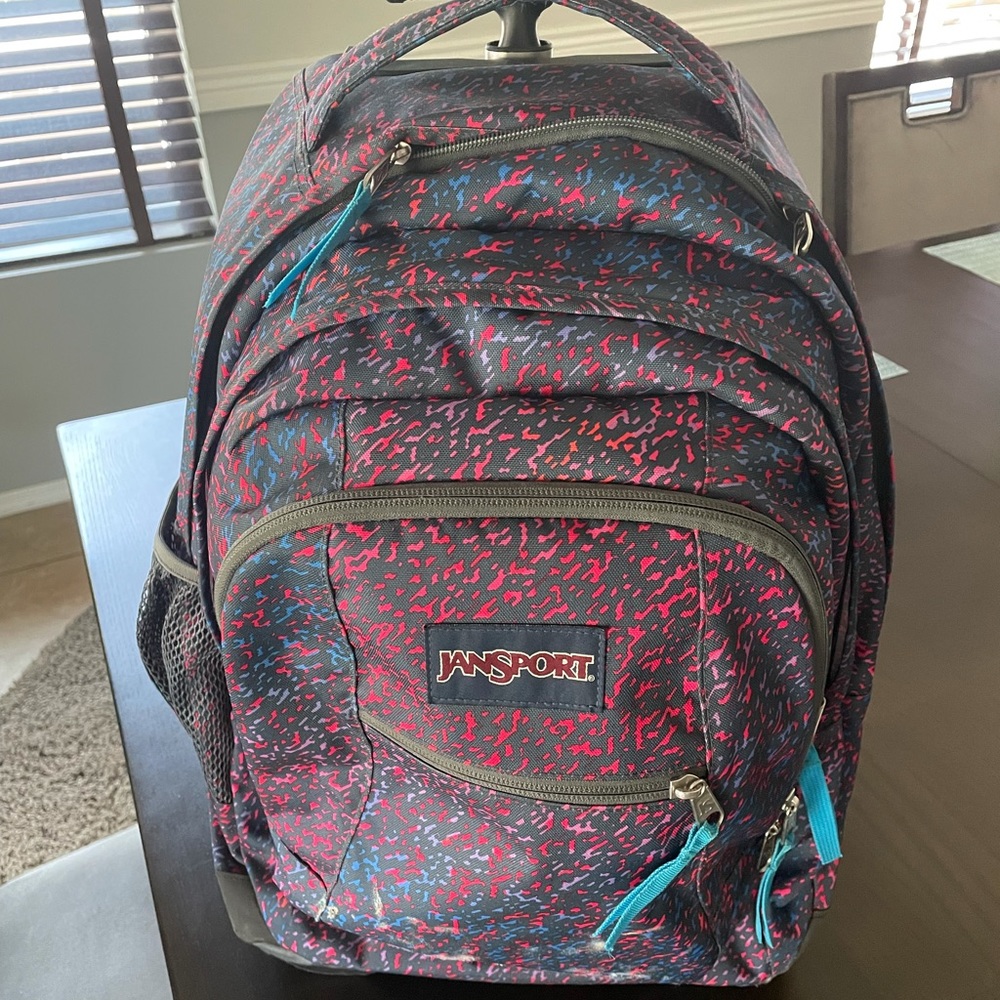 JanSport rolling backpack with laptop sleeve